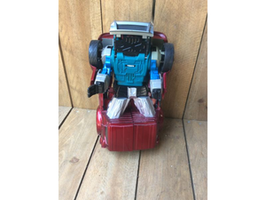 lot 94 image: Large Transforming Car Robot Action Figure