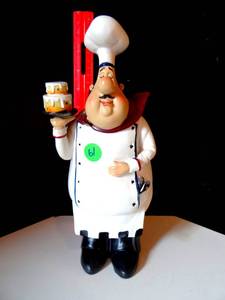 lot 61 image: SLEEPY PASTRY WAITER WITH 2 LAYER CAKE (RESIN)
