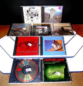 lot 110 image: MUSIC CD COLLECTION - LOT OF 9 ROCK CDs