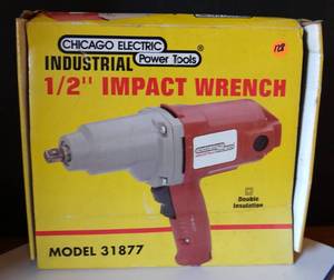lot 128 image: CHICAGO ELECTRIC 12 IMPACT WRENCH - NIB
