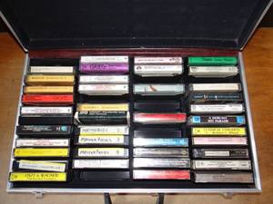 lot 161 image: VINTAGE CASSETTE MUSIC TAPES IN BRIEFCASE STYLE HOLDER