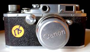 lot 175 image: VINTAGE CANON CAMERA WITH SERENER F2.8 35mm LENS