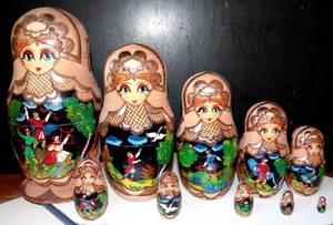 lot 204 image: AMAZING HAND PAINTED 10 PIECE WOODEN NESTING DOLL - VERY COLORFUL