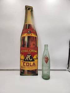 lot 38 image: Vintage Royal Crown cardboard advertisement piece and a vintage RC bottle