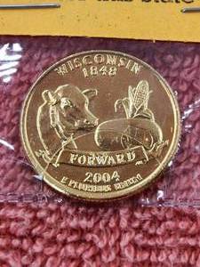 lot 109 image: 2004 - 24kt gold plated uncirculated statehood quarter - Wisconsin