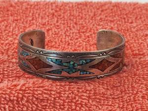 lot 129 image: Narive American Turquoise along with coral inlay silver Bracelet