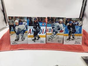lot 174 image: Selection of 4 Toronto Maple Leafs 3 x 5 autographed players photos.  These were signed while owner was a patient at Walter Reed Hospital