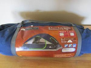 lot 13 image: Camping Tent 9x7 4 used but in original packing