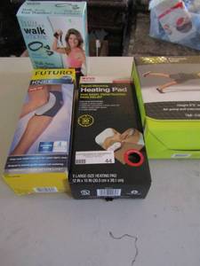 lot 44 image: NIB knee brace, NIB walk belt, fitness  ball Rapid warning Rapid heated pad
