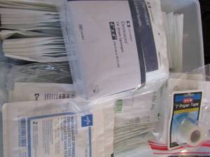 lot 72 image: Medical supplies-4x4 IV drain sponges, 4x4 split sponges 100 and medical tape