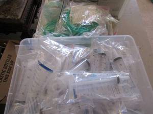 lot 73 image: Medical supplies-50 Oxygen tubing, and Irrigation syringes