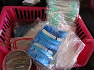 lot 74 image: Medical supplies- Emesis bags, pump infusion kits, suction caths