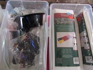 lot 102 image: Tub of giant storage bags and hair tiesclips