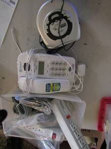 lot 113 image: Digital caller ID phone, GPX CB radio with headphones and extension cords
