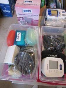 lot 144 image: Tub of bath soaps and holders, BP monitor with 3 cuffs