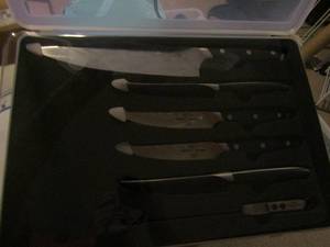 lot 177 image: 2 NEW sets of trusted Butcher kitchen knives both in plastic cases