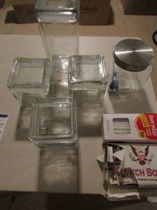 lot 184 image: 4 covered cannisters, glass covered candy dish, and a box of match books
