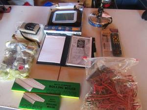 lot 206 image: Digital atomic wall clock, Vivitar digital camera, Rolling rulers, lamp no shade Bag of rubber bands and more