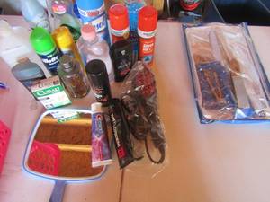 lot 207 image: Opened lot cleaning and bathroom personal items
