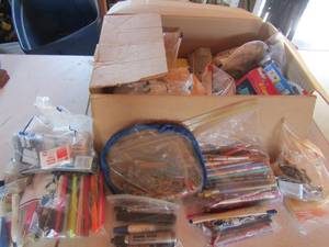 lot 23 image: OFFICE SUPPLIES - Box full of rubber bands, markers, pencils, pens, crayons and more