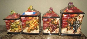 lot 219 image: Set of 4 covered cannisters fruit design