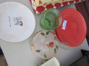 lot 248 image: 4 red swirl plates, 1 green pillar candle holder, 1 shot glass, sugar bowl