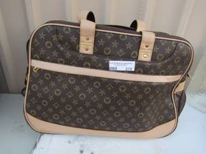 lot 278 image: Rolling suitcase