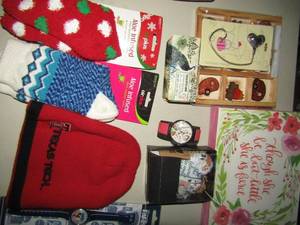 lot 65 image: NEW lot- aloe infused socks, bath soap, paris mickey mouse watch, wooden roller handbag hanger