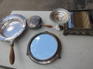 lot 69 image: Silver plate lot- Oval mirror on stand, 1 rectangle mirror 10x10, chafing dish, footed candy dish, silent butler
