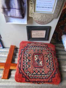 lot 105 image: Misc.- Hand knitted purple and gold scarf, , Indian pillow, 2 framed quotes and more