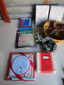 lot 106 image: 6 pimpernel coasters, pair of marble bookends, memo pad and pen, matrix puzzle and more.