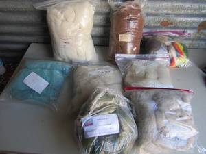 lot 108 image: Box full of yarns - paradise fibers, jubilee, polypay, med brown alpaca, and so much more