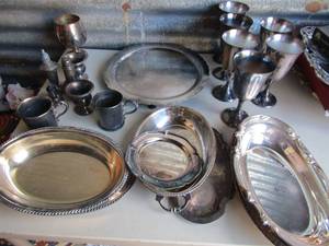 lot 128 image: Silver plated S&P shakers,  6 WINE GOBLETS by WALLACE, , 2 silver bowls,.  small platters,   2 cups with floral design