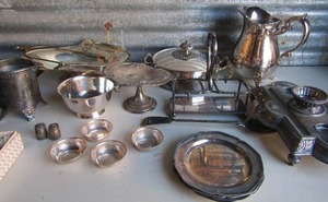 lot 10 image: Silver plated lot- Tea pitcher, bread basket, 6 saucers, creamer covered soup, mini strainer bowls and measuring cup