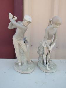 lot 25 image: Lladro Man and Woman Golfers 10