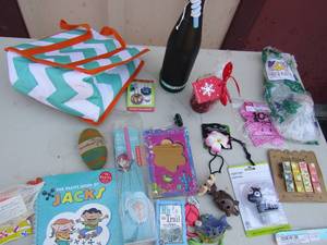 lot 146 image: NEW cheese platter, Jacks game and book, handheld had massager and much more