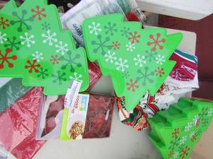 lot 151 image: 3 Christmas tree cookie canisters, gourmet club cookie cutters and tissue paper