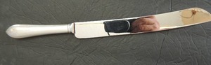lot 216 image: Cake knife- WEB Sterling Handle  Engraved 12 Twt. 84gms. Stainless steel BLADE Sheffield England.
