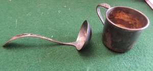 lot 189 image: Sterling silver  toddler cup  1 14 X  2 34  International Sterling  Queens Lace 32 gms.     Preserve ladle  sterling 4 length  wt. 20 gms.