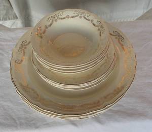 lot 47 image: China Dishes with Gold Trim