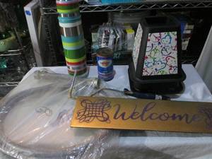 lot 120 image: misc lot, bed risers, paint roller, water hose for refrigerator, Starbucks thermos