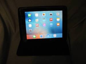 lot 146 image: IPad 16GB Memory, Complete with Harry Potter decals Comes with case and charging cord