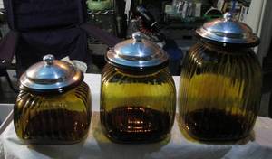lot 175 image: Vintage Artland Amber Canister Set