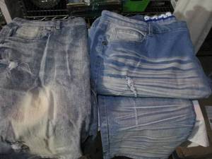 lot 194 image: Mens Designer Pair of Shorts and Pants Brand and Size shown in pictures