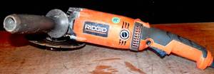 lot 55 image: RIDGID R10202 120V 7in. Angle Grinder wDiamond Cut Off Blade - TESTEDWORKS