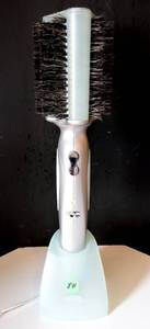 lot 84 image: Revo Styler Rotating Hair Brush Hot Air Straightener System - WORKS