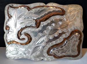lot 101 image: LARGE SILVER FINISH COWBOY STYLE BELT BUCKLE STAMPED HAND MADE