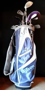 lot 142 image: WILSON PROFILE GOLF BAG LOADED WITH ASSORTED CLUBS & PUTTERS AS SHOWN