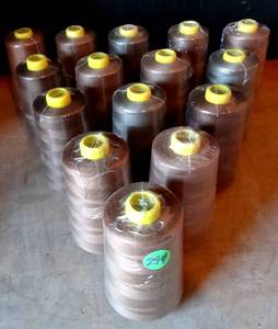lot 294 image: 100 % POLYESTER SEWING THREAD (EMBROIDERY) 15 ROLLS BEIGE & BROWN TONES AS SHOWN (APPROX 6000 YRDS EACH) 15x$
