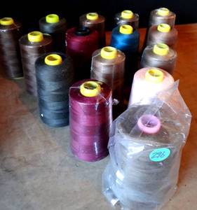 lot 296 image: 100 % POLYESTER SEWING THREAD (EMBROIDERY) 15 ROLLS VARIOUS COLORS AS SHOWN (APPROX 6000 YRDS EACH) 15x$
